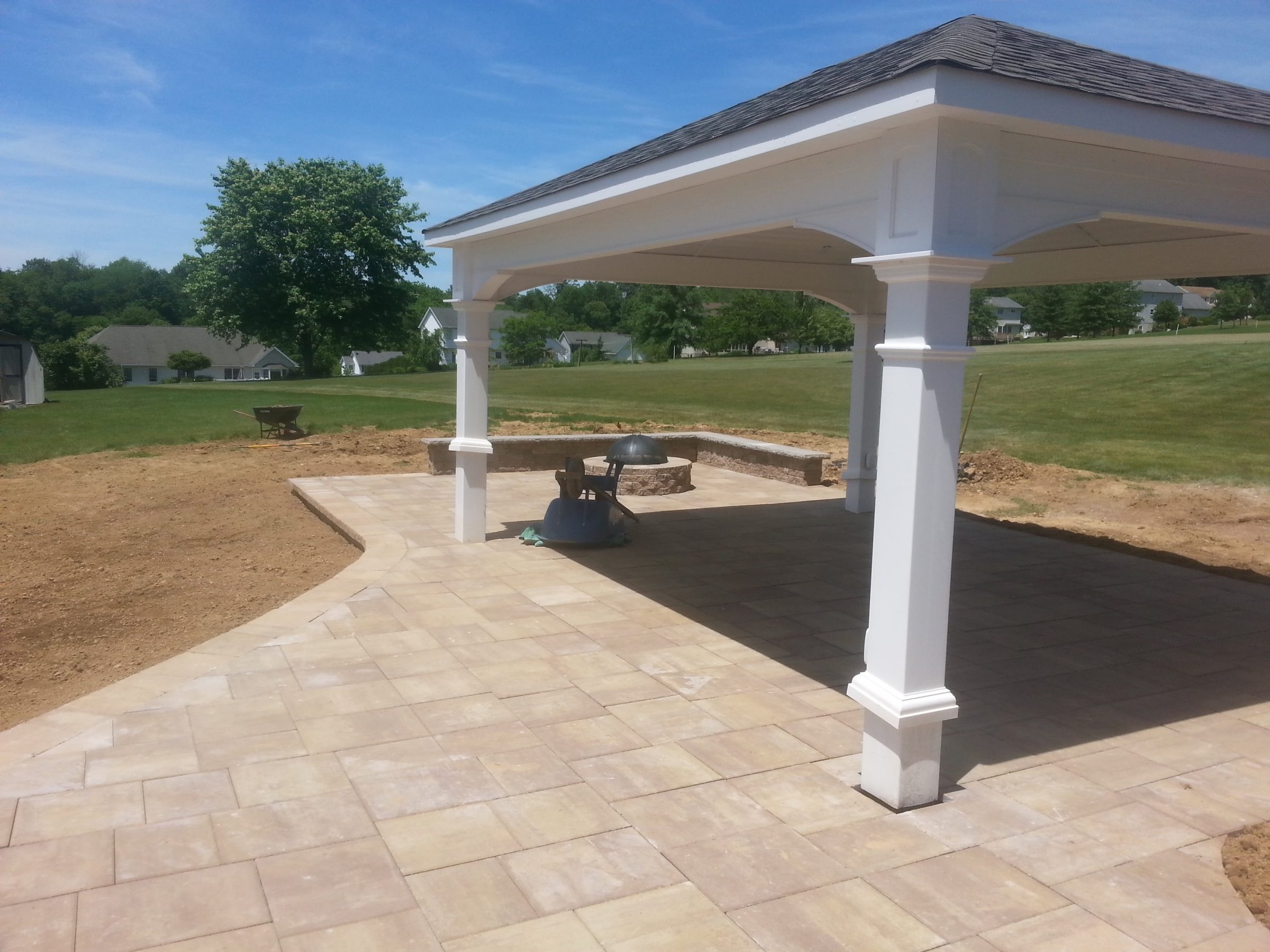 Outdoor pavilion with tiled flooring.
