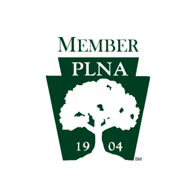 PLNA member logo with tree and date.