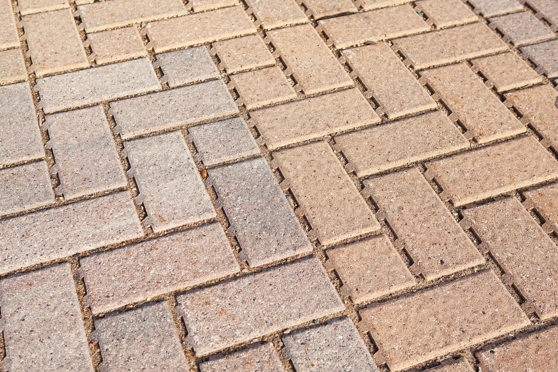 Interlocking brick pavement pattern