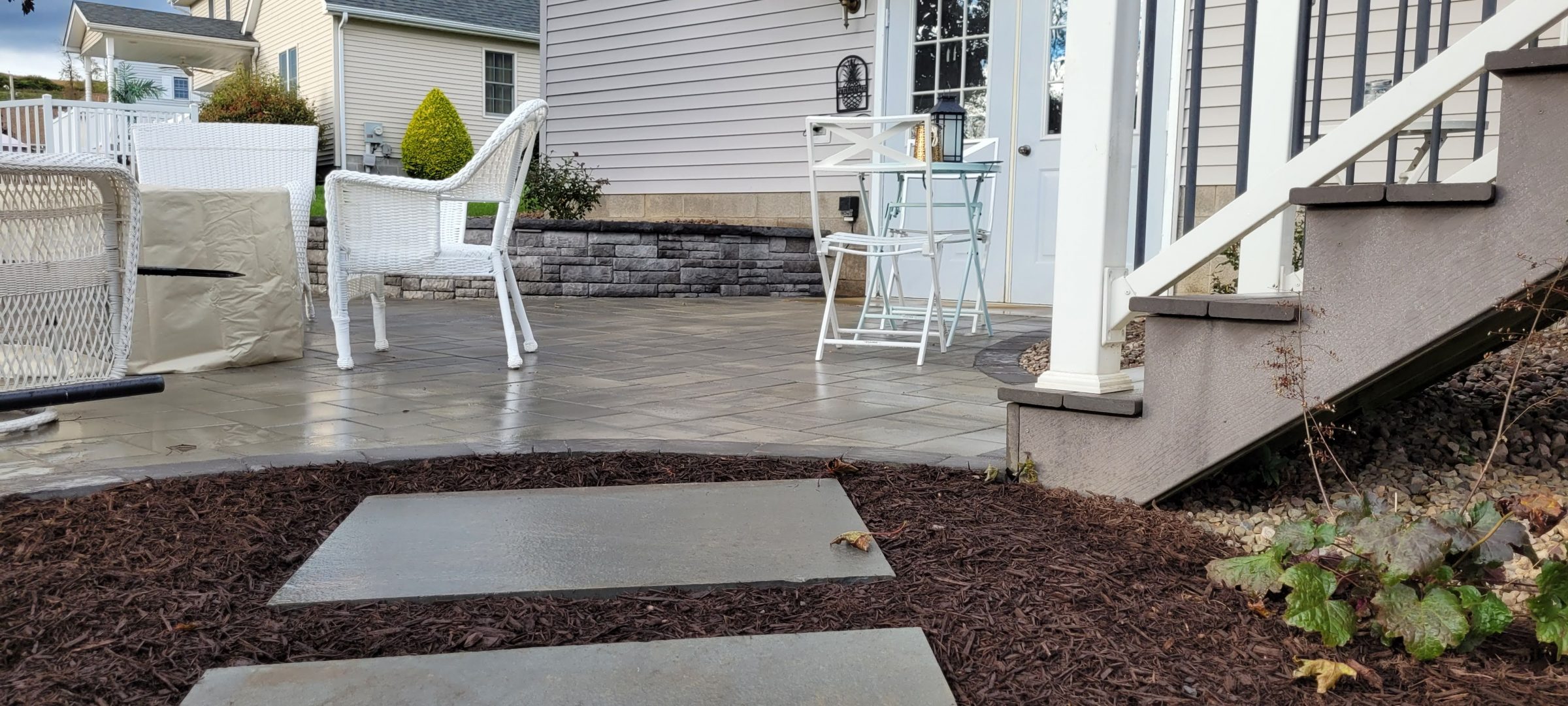 Cozy patio with white outdoor furniture
